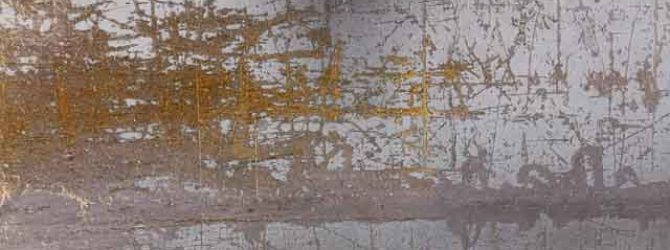Scratches on rusty metal