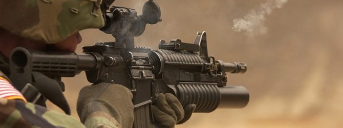 Gun firing a bullet
